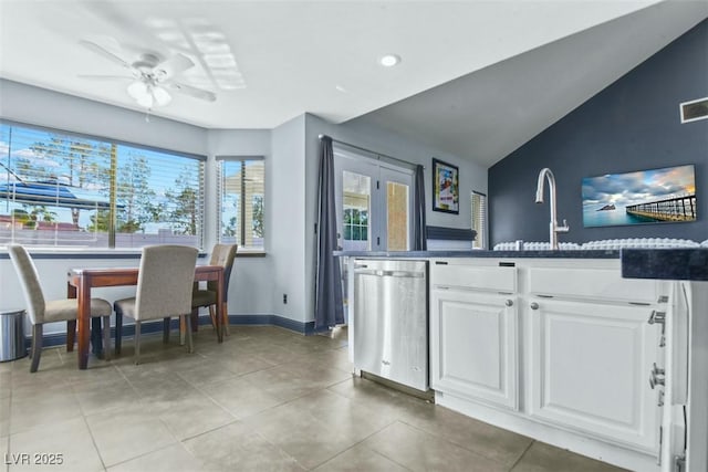 9709 Terrace Green Ave, Las Vegas, NV 89117 - kitchen with stainless steel dishwasher, a sink, white cabinetry, lofted ceiling, and a ceiling fan