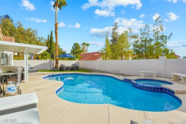 9709 Terrace Green Ave, Las Vegas, NV 89117 - view of pool with a fenced backyard, a patio, a diving board, a pool with connected hot tub, and area for grilling