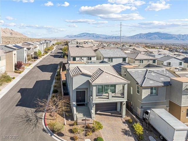 aerial view featuring a residential view and a mountain view