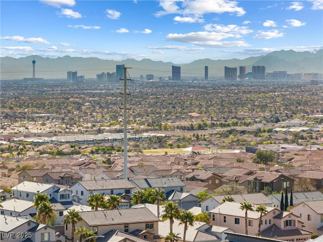 drone / aerial view featuring a mountain view and a residential view