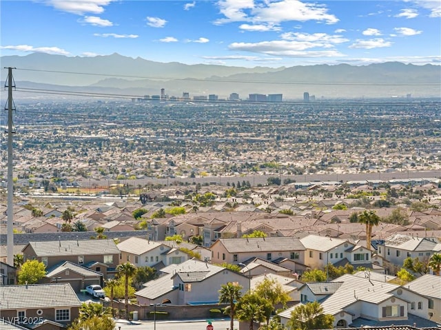 drone / aerial view featuring a mountain view and a residential view