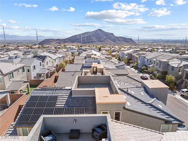 drone / aerial view featuring a mountain view and a residential view
