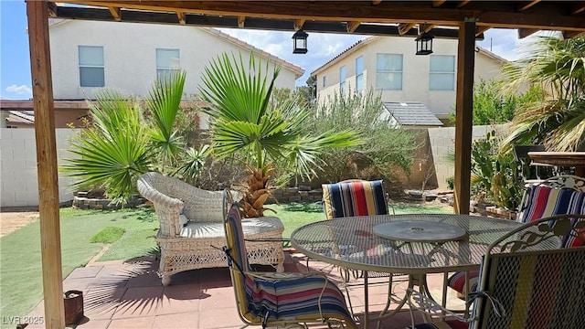 3871 Sir Bret Ct, Las Vegas, NV 89104 - view of patio featuring a fenced backyard and outdoor dining space
