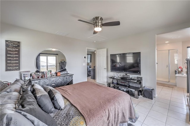 415 Carsin Wayne Ct, North Las Vegas, NV 89031 - bedroom with light tile patterned floors, a ceiling fan, and ensuite bathroom