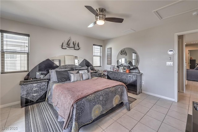 415 Carsin Wayne Ct, North Las Vegas, NV 89031 - bedroom with light tile patterned floors, baseboards, and a ceiling fan