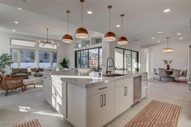 12199 Canyon Sunset St, Las Vegas, NV 89138 - kitchen with an inviting chandelier, a sink, open floor plan, recessed lighting, and a spacious island