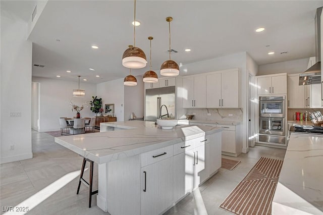 12199 Canyon Sunset St, Las Vegas, NV 89138 - kitchen with tasteful backsplash, visible vents, recessed lighting, white cabinetry, and stainless steel appliances