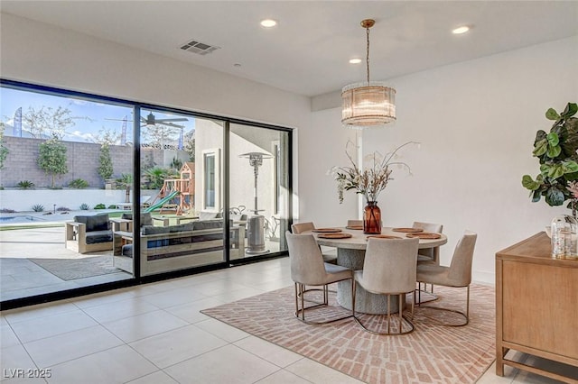 12199 Canyon Sunset St, Las Vegas, NV 89138 - dining room with light tile patterned flooring, a notable chandelier, visible vents, and recessed lighting