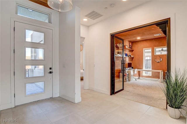 12199 Canyon Sunset St, Las Vegas, NV 89138 - tiled entryway with visible vents, baseboards, recessed lighting, and carpet flooring