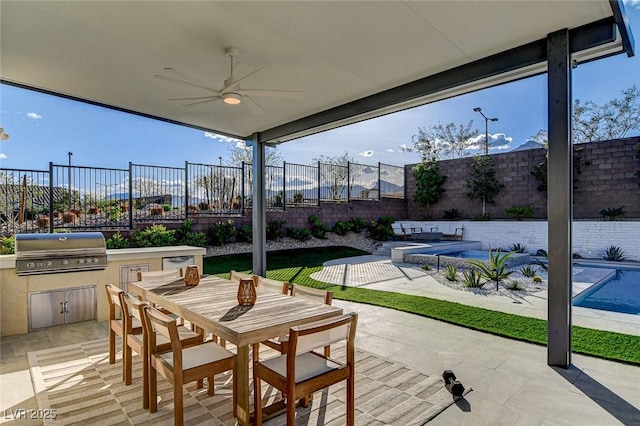 12199 Canyon Sunset St, Las Vegas, NV 89138 - view of patio with a fenced backyard, outdoor dining space, ceiling fan, and area for grilling