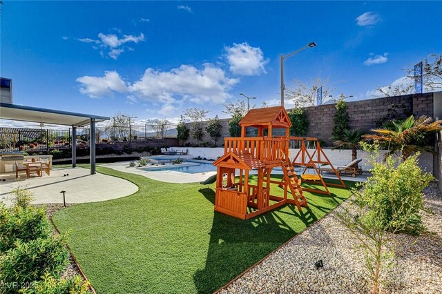 12199 Canyon Sunset St, Las Vegas, NV 89138 - view of playground featuring a fenced in pool, a patio area, a fenced backyard, and a yard