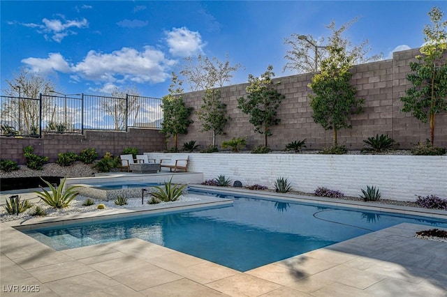 12199 Canyon Sunset St, Las Vegas, NV 89138 - view of swimming pool with a patio area, a fenced backyard, and a fenced in pool