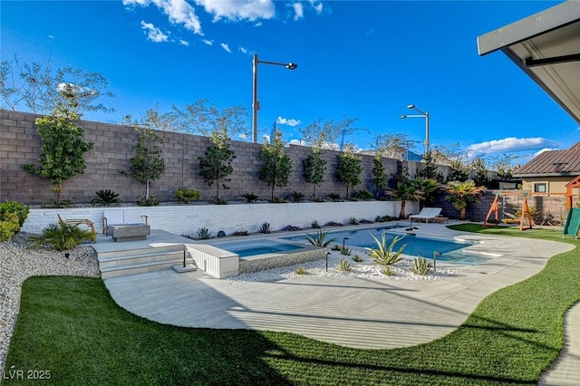 12199 Canyon Sunset St, Las Vegas, NV 89138 - view of pool featuring a fenced in pool, a patio, an in ground hot tub, a fenced backyard, and playground community