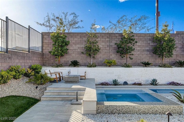 12199 Canyon Sunset St, Las Vegas, NV 89138 - view of swimming pool featuring a fenced backyard, an in ground hot tub, and a patio area