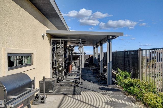 12199 Canyon Sunset St, Las Vegas, NV 89138 - view of patio with grilling area and fence