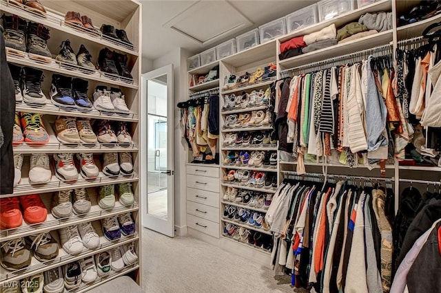 12199 Canyon Sunset St, Las Vegas, NV 89138 - spacious closet featuring carpet flooring and attic access