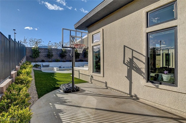 12199 Canyon Sunset St, Las Vegas, NV 89138 - view of basketball court with a yard and a fenced backyard