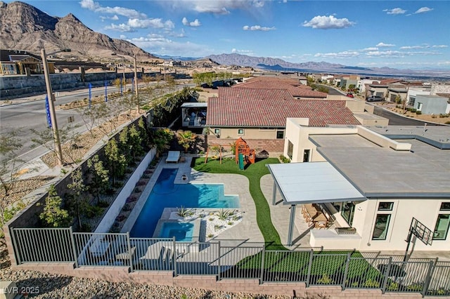 12199 Canyon Sunset St, Las Vegas, NV 89138 - view of pool with a mountain view, a residential view, and fence private yard