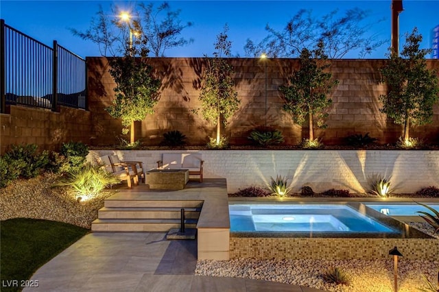 12199 Canyon Sunset St, Las Vegas, NV 89138 - view of pool featuring a patio area, fence, and an in ground hot tub