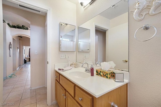 1066 Vanlier Ln, Henderson, NV 89015 - bathroom featuring tile patterned floors, vanity, and baseboards