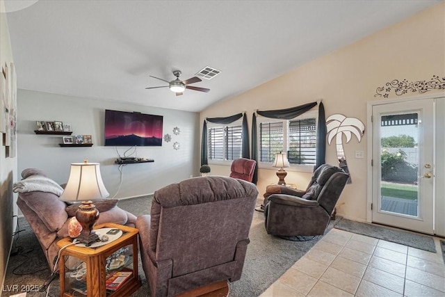 1066 Vanlier Ln, Henderson, NV 89015 - tiled living area featuring healthy amount of natural light, lofted ceiling, and a ceiling fan