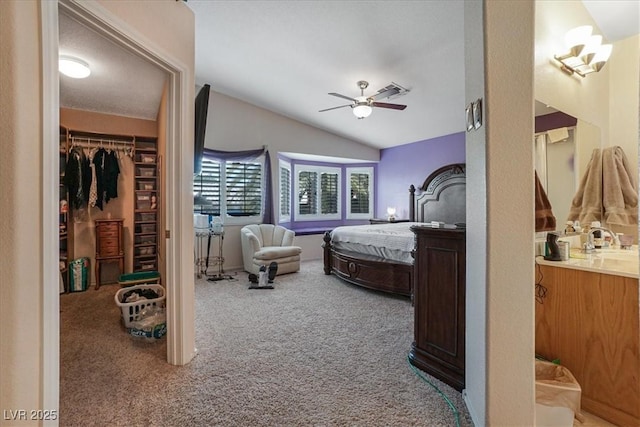 1066 Vanlier Ln, Henderson, NV 89015 - bedroom with carpet floors, lofted ceiling, a spacious closet, a closet, and ceiling fan
