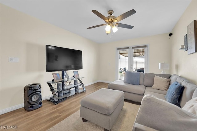 5530 Berchmans Ave, Las Vegas, NV 89122 - living room with baseboards, wood finished floors, and ceiling fan