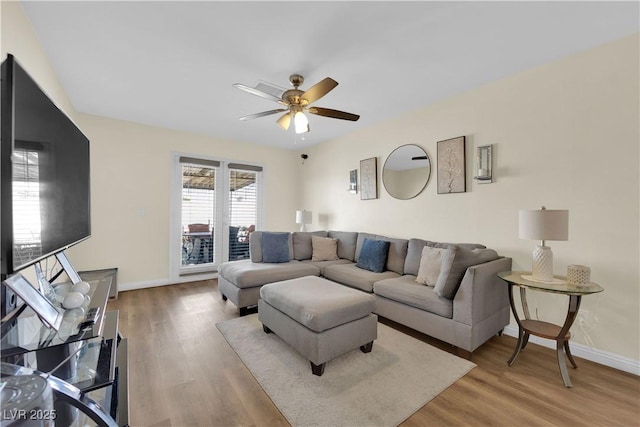5530 Berchmans Ave, Las Vegas, NV 89122 - living room featuring wood finished floors, baseboards, and ceiling fan