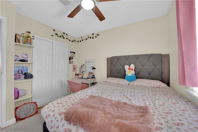 5530 Berchmans Ave, Las Vegas, NV 89122 - bedroom with a ceiling fan, visible vents, carpet, and a closet
