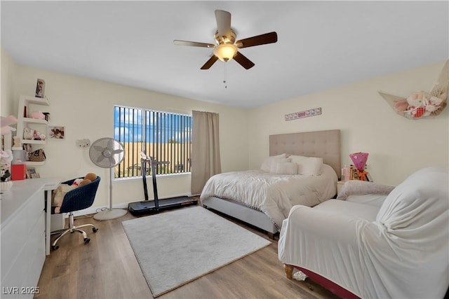 5530 Berchmans Ave, Las Vegas, NV 89122 - bedroom featuring a ceiling fan and light wood-style flooring