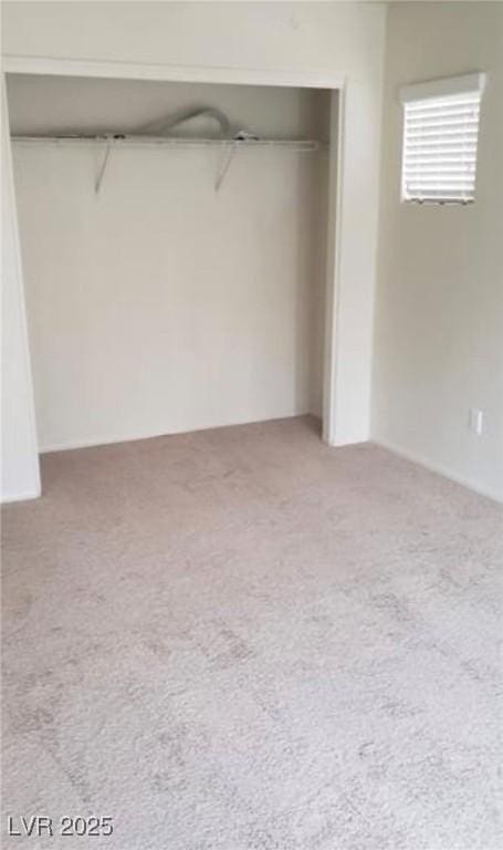 spare room featuring carpet