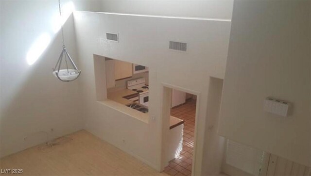 6974 Emerald Springs Ln, Las Vegas, NV 89113 - stairway featuring visible vents