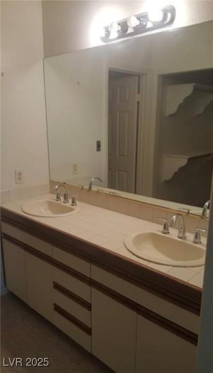 6974 Emerald Springs Ln, Las Vegas, NV 89113 - full bath with double vanity and a sink