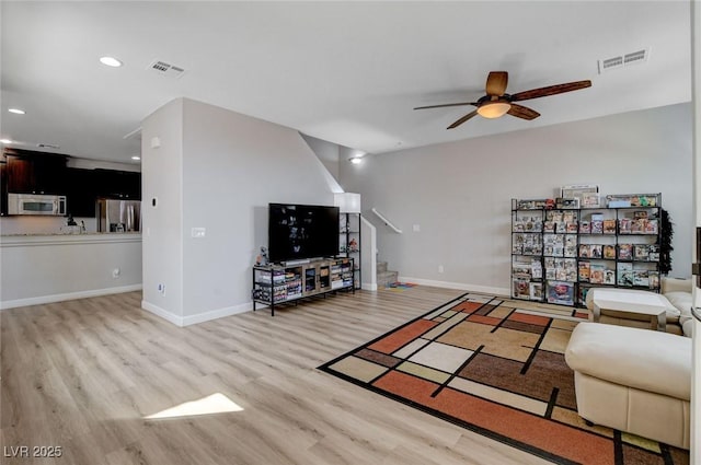 11036 Mount Hunter St, Las Vegas, NV 89179 - living area with wood finished floors, ceiling fan, and recessed lighting