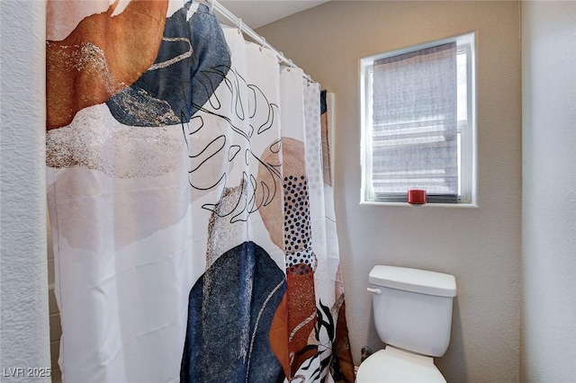 11036 Mount Hunter St, Las Vegas, NV 89179 - bathroom featuring toilet and curtained shower