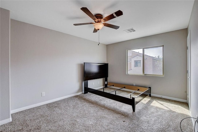 bedroom featuring carpet floors, baseboards, and ceiling fan
