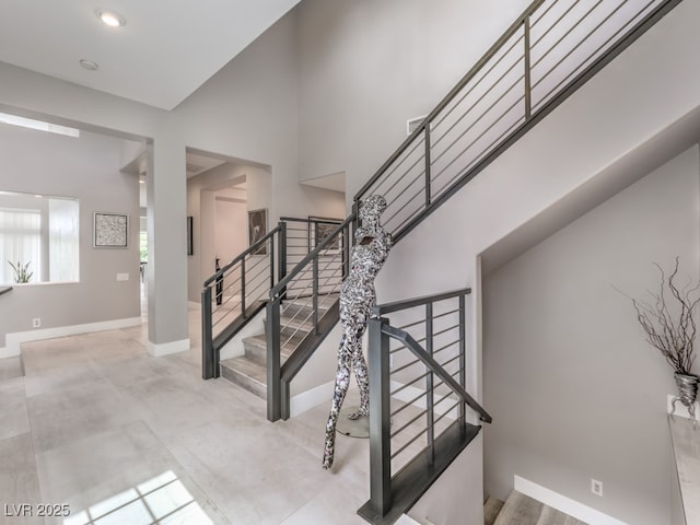 5 Clear Crossing Trl, Henderson, NV 89052 - stairway with baseboards and a towering ceiling