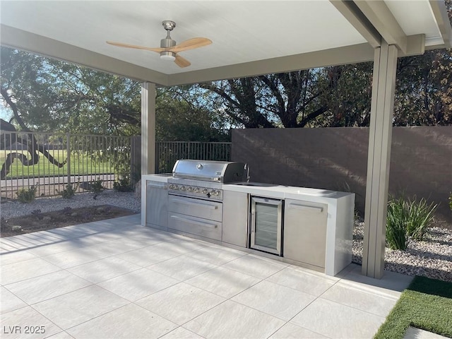 5 Clear Crossing Trl, Henderson, NV 89052 - view of patio / terrace featuring an outdoor kitchen, a ceiling fan, and beverage cooler