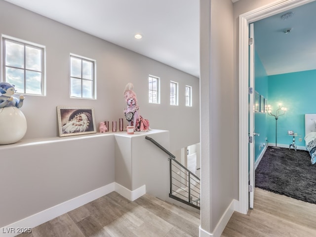 5 Clear Crossing Trl, Henderson, NV 89052 - hall featuring an upstairs landing, wood finished floors, healthy amount of natural light, and recessed lighting