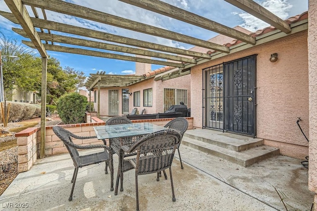view of patio / terrace featuring outdoor dining area and a pergola