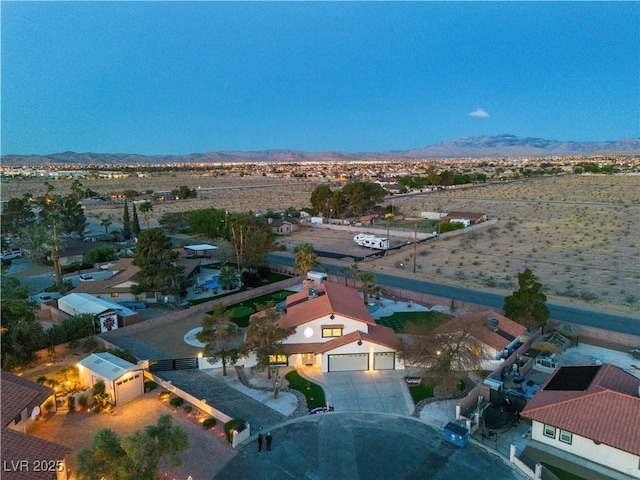 aerial view with a mountain view and view of desert