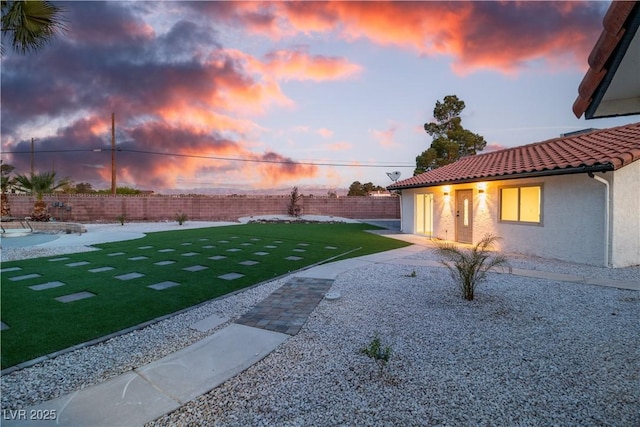 view of yard with a patio and a fenced backyard