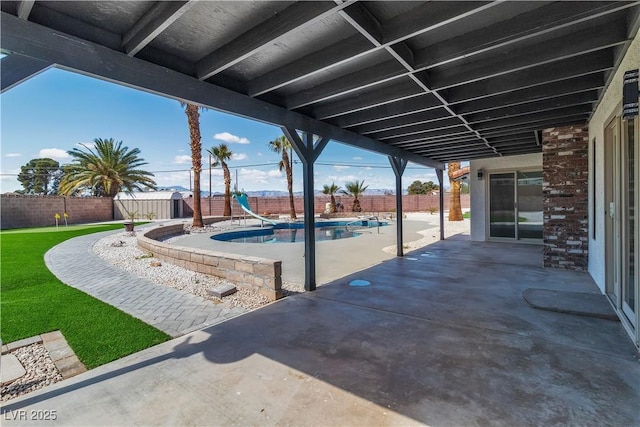 view of patio with a fenced backyard and a fenced in pool