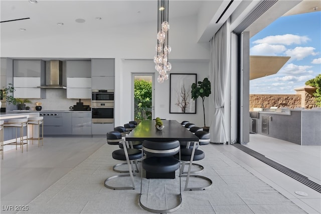 667 Palisade Rim Dr, Henderson, NV 89012 - dining room featuring light tile patterned floors