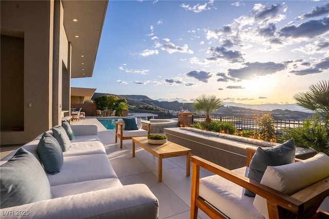 667 Palisade Rim Dr, Henderson, NV 89012 - view of patio / terrace featuring an outdoor hangout area and a mountain view