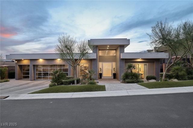 667 Palisade Rim Dr, Henderson, NV 89012 - property at dusk featuring driveway