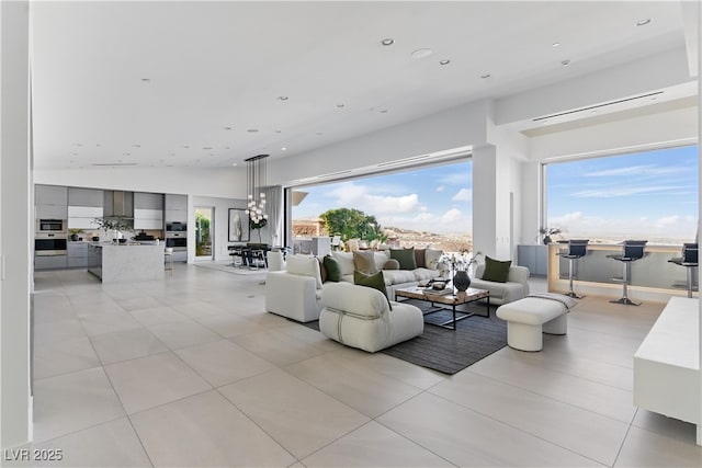 667 Palisade Rim Dr, Henderson, NV 89012 - living area featuring light tile patterned flooring and recessed lighting