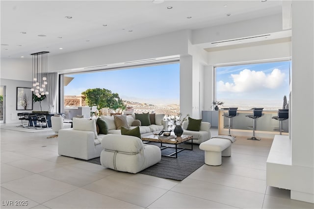 667 Palisade Rim Dr, Henderson, NV 89012 - living room with light tile patterned flooring, healthy amount of natural light, and recessed lighting