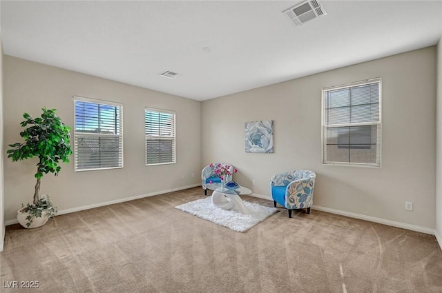 7216 Campolina Ct, Las Vegas, NV 89113 - sitting room featuring baseboards, visible vents, and carpet floors