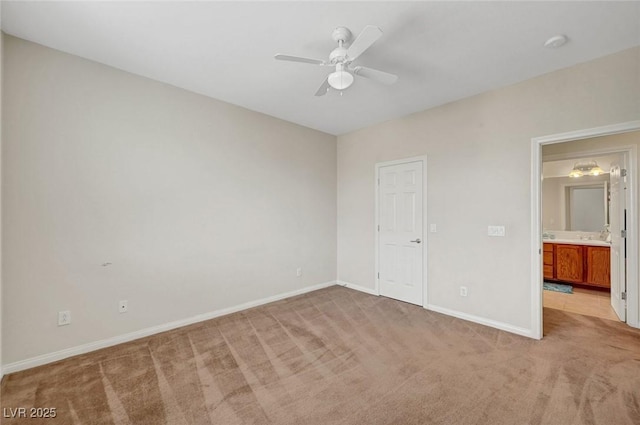 7216 Campolina Ct, Las Vegas, NV 89113 - unfurnished bedroom with a ceiling fan, baseboards, and light colored carpet